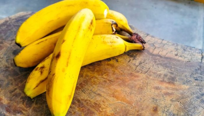 Bananas banana fruit fruits on wooden table in Zicatela Puerto Escondido Oaxaca Mexico.,Image: 769236911, License: Royalty-free, Restrictions: , Model Release: no, Credit line: Arkadij Schell / Panthermedia / Profimedia