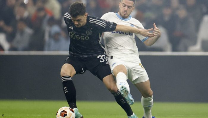 Soccer Football - Europa League - Group B - Olympique de Marseille v Ajax Amsterdam - Orange Velodrome, Marseille, France - November 30, 2023 Ajax Amsterdam's Benjamin Tahirovic in action with Olympique de Marseille's Jordan Veretout REUTERS/Sarah Meyssonnier