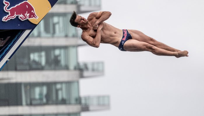 Aidan Heslop of the UK dives from the 27.5 metre platform during the final competition day of the first stop of the Red Bull Cliff Diving World Series in Boston, USA on June 03, 2023. // Dean Treml / Red Bull Content Pool // SI202306030650 // Usage for editorial use only //