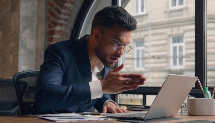 angry-mad-businessman-indian-arabian-guy-male-furious-annoyed-man-boss-leader-talk-video-call-online_717737-21140