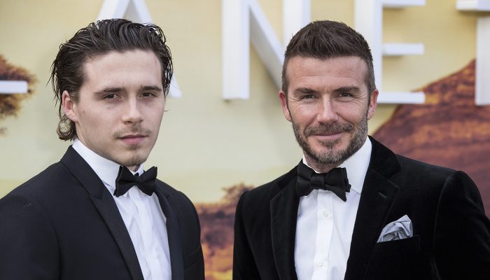 Brooklyn Beckham, left and his father David Beckham, pose for photographers upon arrival for the premiere of a new series of Our Planet, at the Natural History Museum in central London, Tuesday, April 4, 2019. (Photo by Joel C Ryan/Invision/AP)