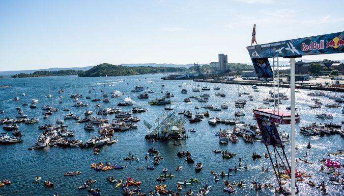 Owen Weymouth of the UK prepares to launch an armstand dive  from the 27 metre platform at the Oslo Opera House during the final competition day of the fourth stop of the Red Bull Cliff Diving World Series in Oslo, Norway on August 13, 2022. // SI202208130299 // RBMN / Red Bull Cliff Diving World Series / 2022 / Stop 4 - Oslo, Norway // Romina Amato / Red Bull Content Pool