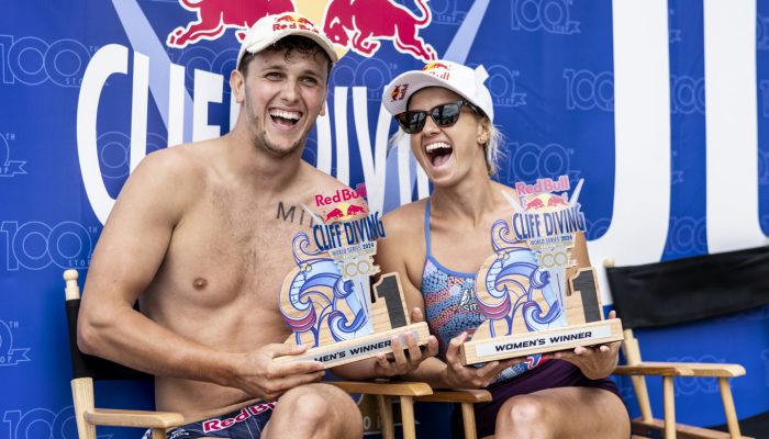 Aidan Heslop (L) of the UK and Rhiannan Iffland of Australia celebrate with the winners trophies during the final competition day of the second stop of the 2024 Red Bull Cliff Diving World Series in Boston, USA on June 8, 2024. // Dean Treml / Red Bull Content Pool // SI202406080647 // Usage for editorial use only //