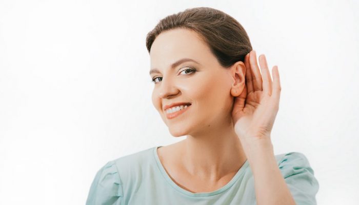 smiling-hearing-loss-patient-is-struggling-to-hear-properly