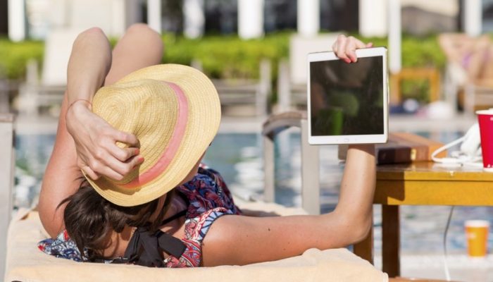 woman-looking-tablet-1750325505-821x550